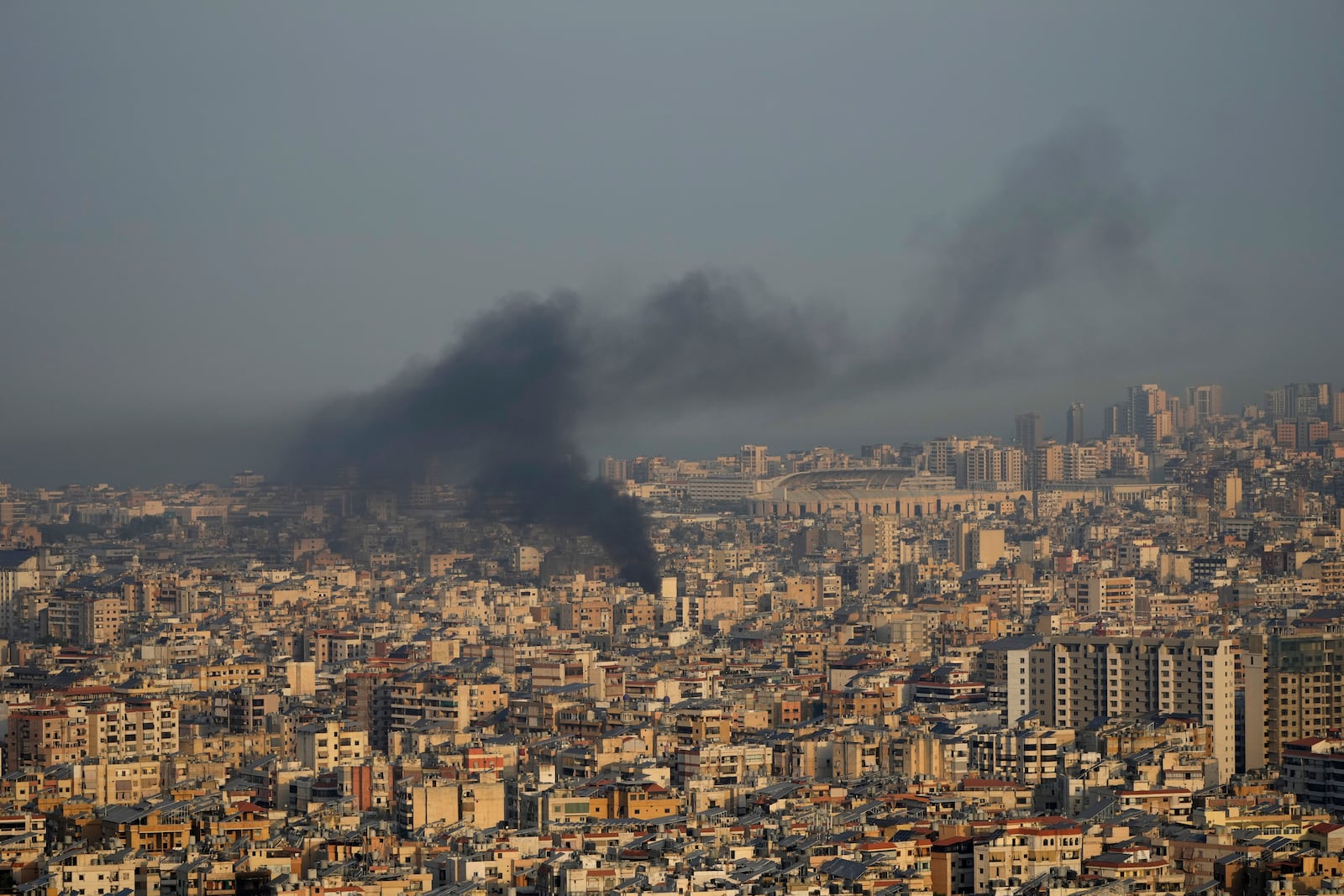 Smoke rise from Israeli airstrikes on Dahiyeh, Beirut's southern suburbs, Lebanon, Wednesday, Oct. 16, 2024. (AP Photo/Hussein Malla)