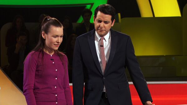 Atlanta native Jessica Sams, left, stands next to “Idiotest” host Ben Gleib, right, during an individual test portion in her appearance on the show. The episode will air March 23 at 10 p.m. Courtesy: Game Show Network