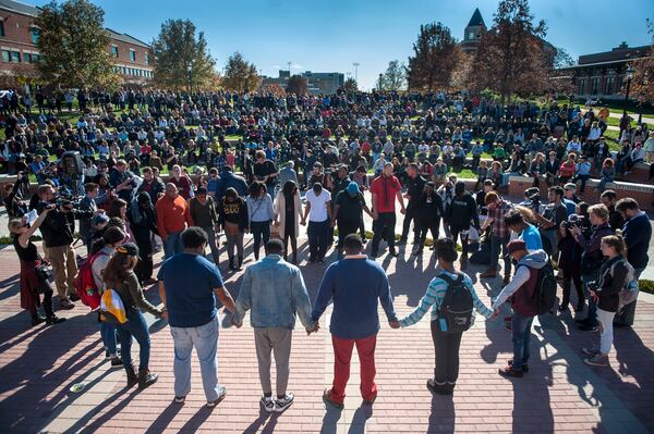 Protesters, students and media fill Traditions Plaza during a press conference following the Concerned Students 1950 protest on Monday, Nov. 9 2015, in Columbia, Mo. (Michael Cali/San Diego Union-Tribune/TNS)