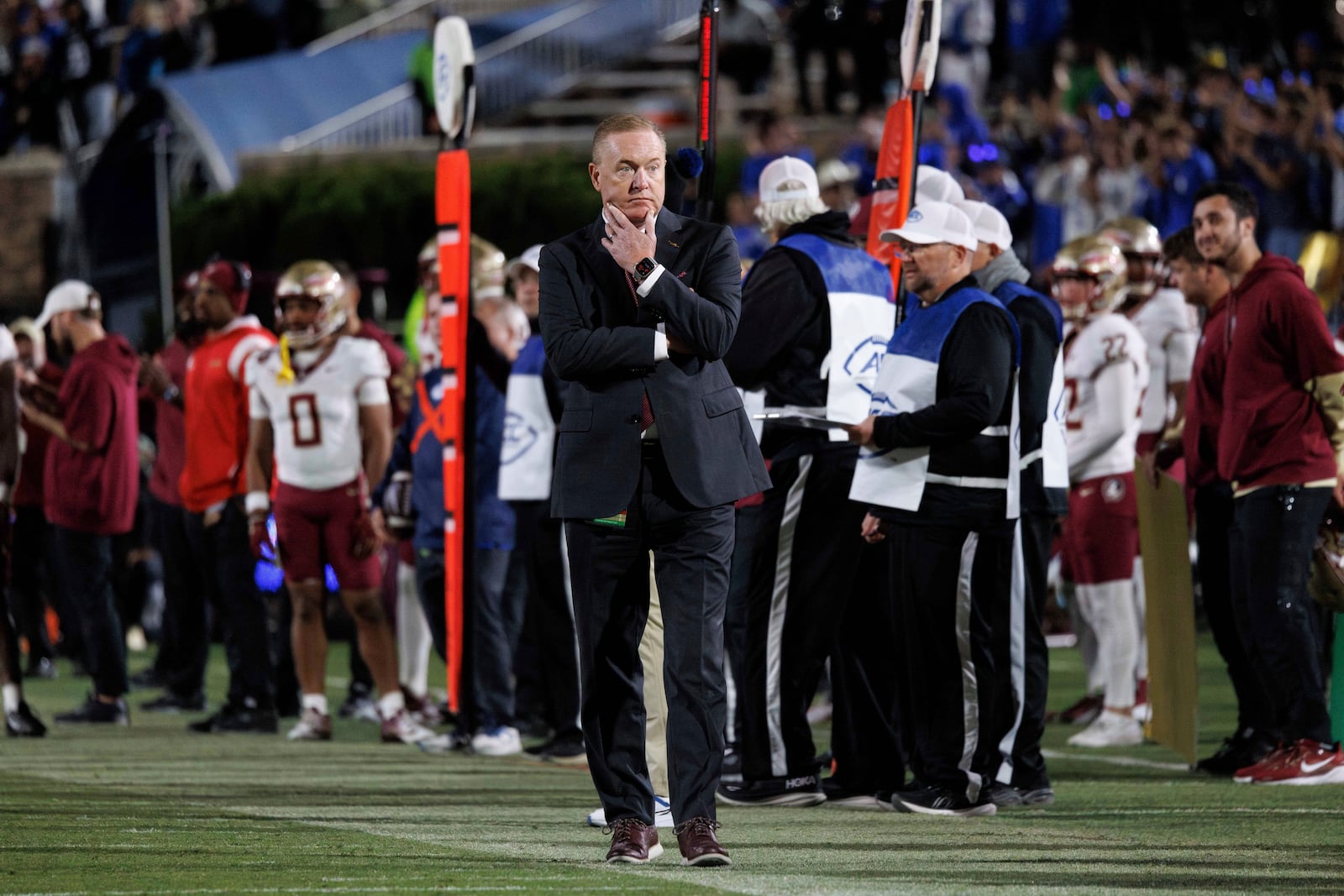 Florida State athletic director Michael Alford, center, reacts after a play late in the second half of an NCAA college football game against Duke in Durham, N.C., Friday, Oct. 18, 2024. (AP Photo/Ben McKeown)