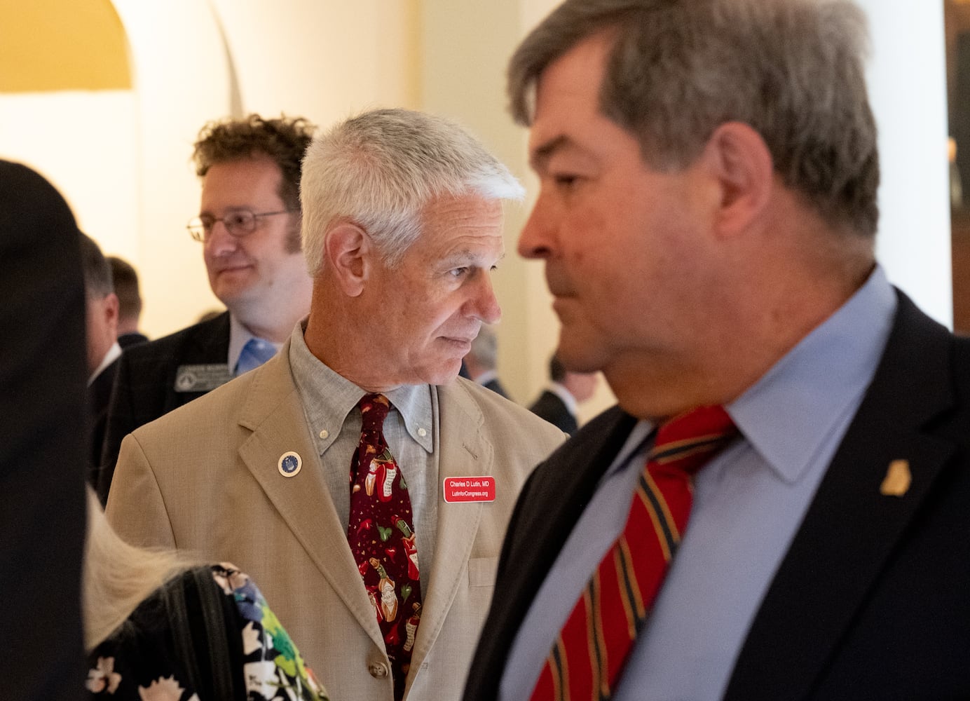 Dr. Charles Lutin waits in line to qualify to challenge Rep. Marjorie Taylor Greene on the first day of qualifying Monday, March 7, 2022, at the Georgia State Capitol. (Ben Gray for The Atlanta Journal-Constitution)