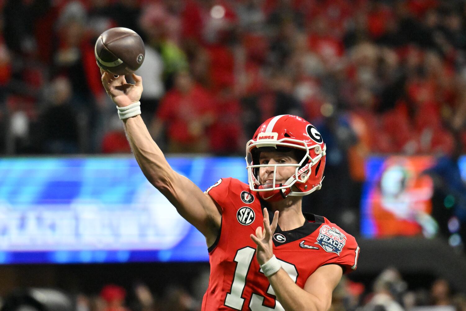 Georgia Bulldogs quarterback Stetson Bennett warms up before the College Football Playoff Semifinal between the Georgia Bulldogs and the Ohio State Buckeyes at the Chick-fil-A Peach Bowl In Atlanta on Saturday, Dec. 31, 2022. (Hyosub Shin / Hyosub.Shin@ajc.com)