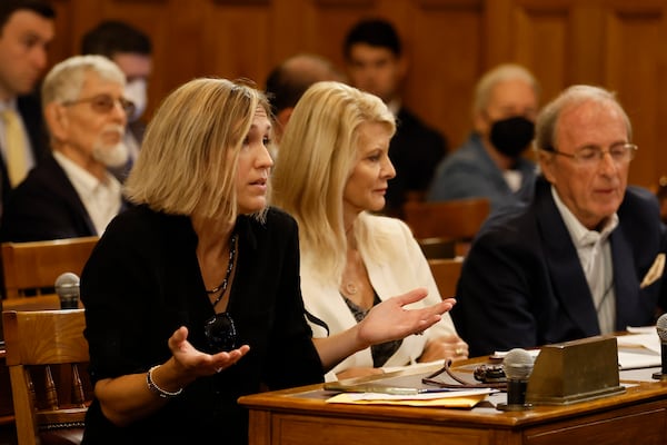 Members of the public ask questions during a State Board of Elections meeting Wednesday. The board discussed Coffee County investigations, Dominion Voting Systems machines and audits. Miguel Martinez / miguel.martinezjimenez@ajc.com 