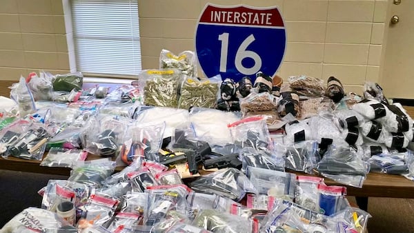 Some of the drugs, guns and other items confiscated by law enforcement officials on March 14 and 15 during Operation Wrong Exit along I-16 in Twiggs County. (Contributed photo)