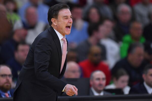 St. John's head coach Rick Pitino calls to his players during the first half in the second round of the NCAA college basketball tournament, Saturday, March 22, 2025, in Providence, R.I. (AP Photo/Steven Senne)