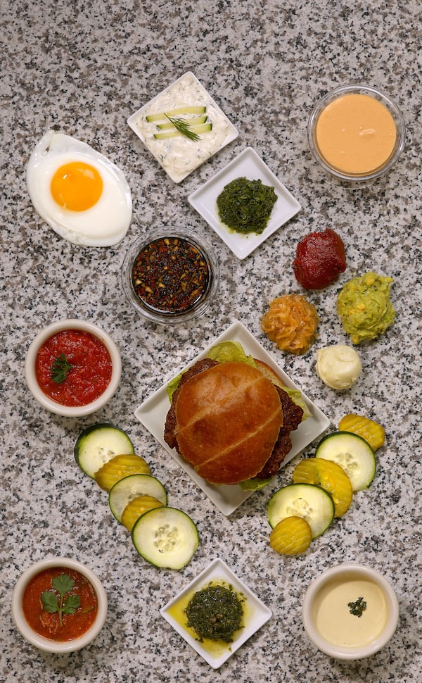 An array of toppings designed to make your burger better, on Wednesday, May 9, 2018, in the Post-Dispatch studio (Christian Gooden/St. Louis Post-Dispatch/TNS)