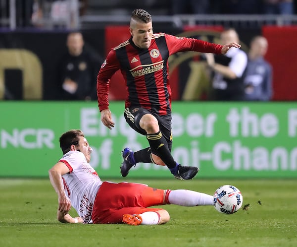 Greg Garza of Atlanta United makes a move past N.Y. Red Bulls defender Alex Muyl during the first half of their first game in franchise history Sunday, March 5, 2017, in Atlanta. Curtis Compton/ccompton@ajc.com