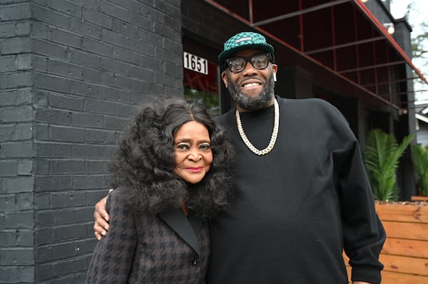 Killer Mike (right) poses with former owner Helen Harden during the soft opening of Bankhead Seafood on Wednesday, Nov. 13, 2024, in Atlanta. Harden admitted running the restaurant for 50 years came with highs and lows. (Hyosub Shin/AJC)