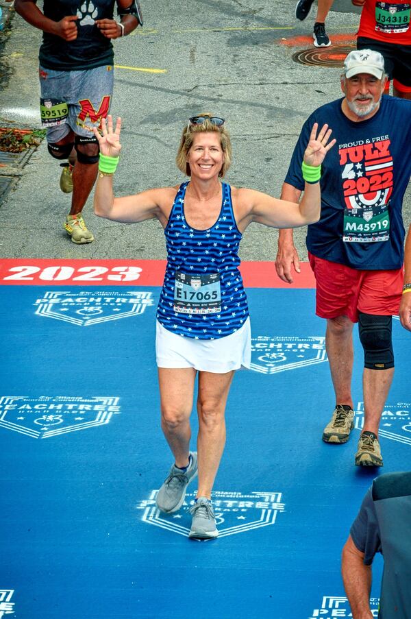 Metro Atlanta Chamber president and CEO Katie Kirkpatrick runs the Peachtree Road Race. Courtesy of Katie Kilpatrick