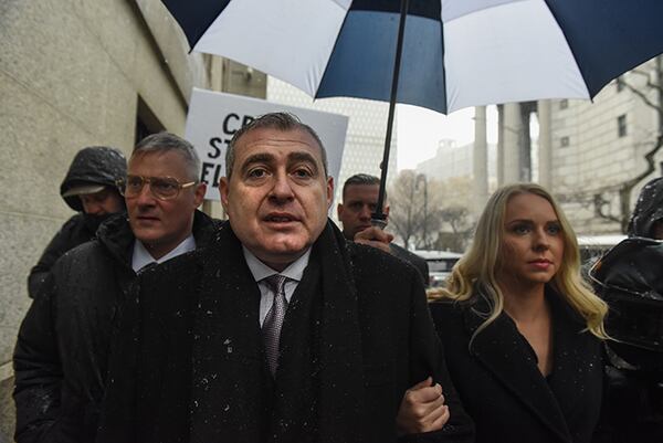 Lev Parnas arrives with his wife Svetlana Parnas at federal court on December 2, 2019 in New York City. Parnas, an associate of President Trump's personal lawyer Rudy Giuliani, was arrested in October on charges of illegally funneling money to a pro-Trump election committee and other politicians.