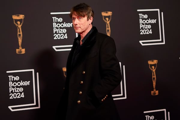 Brett Anderson arrives at the Booker Prize award dinner in London, Tuesday, Nov. 12, 2024. (AP Photo/Alberto Pezzali)