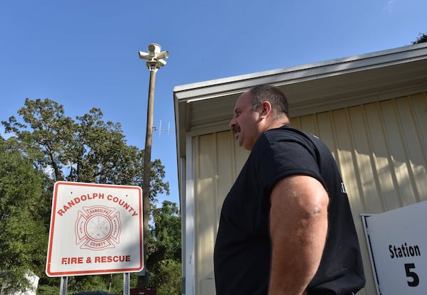 Kenneth Burns, Randolph County emergency management agency director, visits #5 fire station, where a new siren tower has been installed to warn area residents of approaching storms. Roughly half the county’s homes were damaged in 2018 from Hurricane Michael, when the local hospital’s backup generator faltered. (Hyosub Shin / Hyosub.Shin@ajc.com)