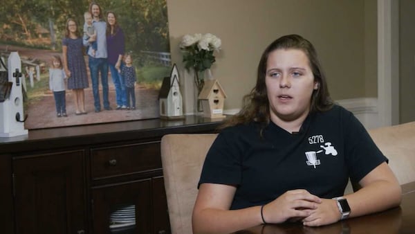 Taylor Jones, 17, a student at Brookwood High School in Gwinnett County, makes sure the clothing she wears to school every day would conceal her in case of an intruder alert. (Tyson A. Horne/tyson.horne@ajc.com.)