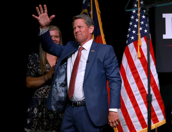 Republican gubernatorial candidate Gov. Brian Kemp waves during his primary night election party at the Chick-fil-A College Football Hall of Fame on May 24, 2022 in Atlanta, Georgia. (Joe Raedle/Getty Images/TNS)