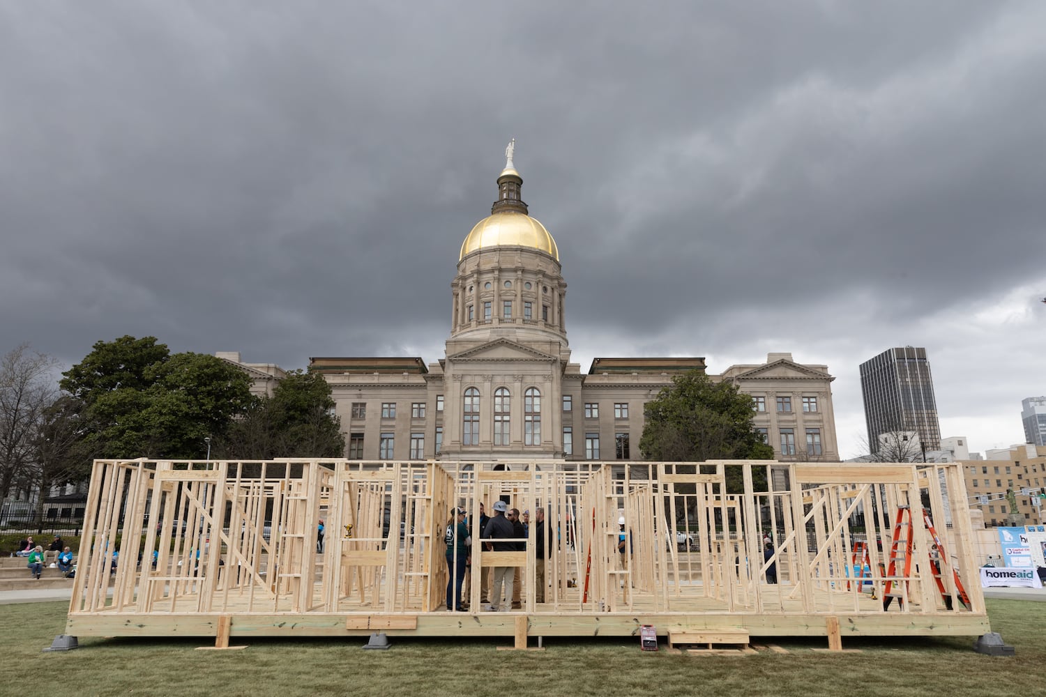 Habitat for Humanity built the frame of a home at Liberty Plaza, outside the Capitol, in Atlanta on Wednesday, March 5, 2025. The frame will later be transported and used to house a family. (Arvin Temkar / AJC)