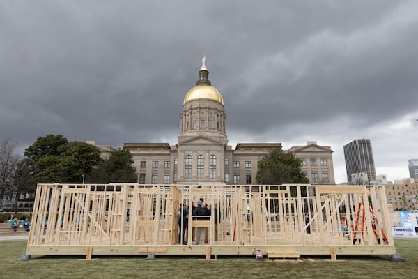 The frame coming together at Liberty Plaza. It will later be transported and used to house a family. 