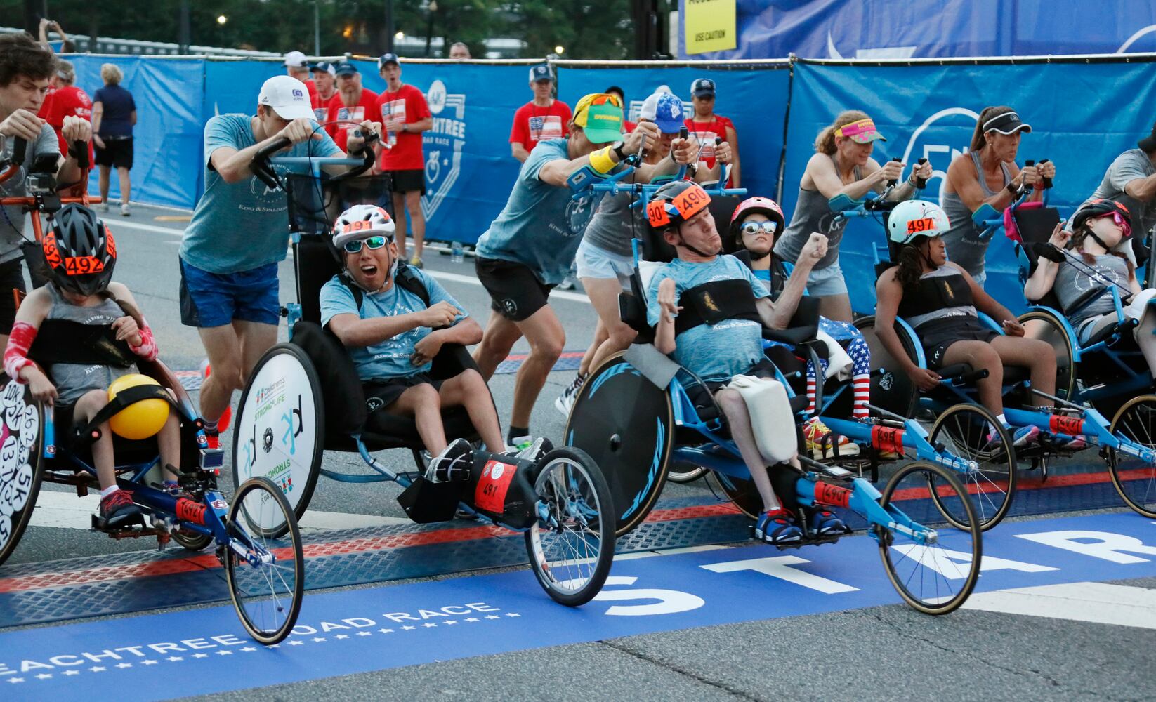 PHOTOS: Scenes at 2019 AJC Peachtree Road Race