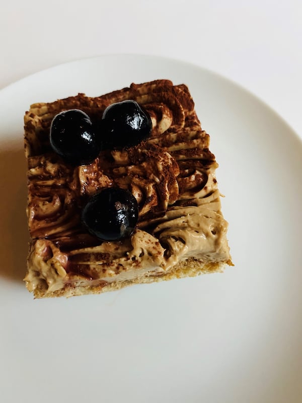 This order of tiramisu includes luxardo cherries. Bob Townsend for The Atlanta Journal-Constitution