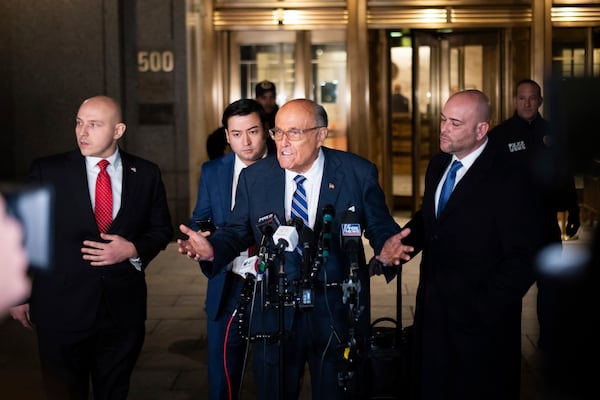 Rudy Giuliani speaks to the media outside of Manhattan federal court in New York, on Friday, Jan. 3, 2025. (AP Photo/Adam Gray)