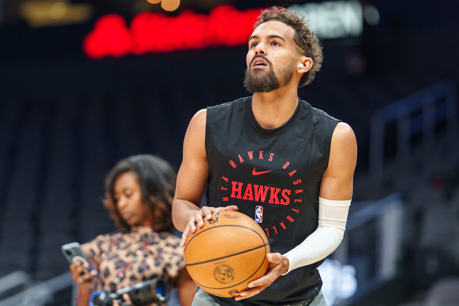 Atlanta Hawks guard Trae Young warms up before an NBA basketball game against the Charlotte Hornets, Friday, Oct. 25, 2024, in Atlanta. (AP Photo/Jason Allen)