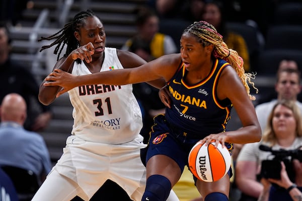 Atlanta Dream center Tina Charles (31) defends against Indiana Fever forward Aliyah Boston (7) on Thursday, May 9, 2024. (AP Photo/Darron Cummings)