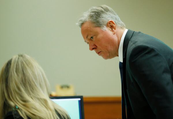 September 27, 2019 - Decatur - Robert Olsen confers with  Defense attorney Amanda Clark Palmer between witnesses this morning. The murder trial of former DeKalb County Police Officer Robert "Chip" Olsen continued with testimony from prosecution witnesses this morning.  Olsen is charged with murdering war veteran Anthony Hill.  Bob Andres / robert.andres@ajc.com