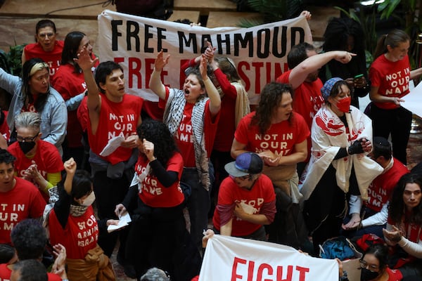 Demonstrators from the group, Jewish Voice for Peace, protest inside Trump Tower in support of Columbia graduate student Mahmoud Khalil, Thursday, March 13, 2025, in New York. (AP Photo/Yuki Iwamura)