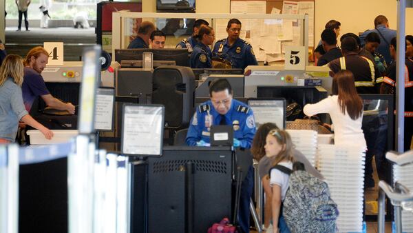 Travelers are allowed to carry marijuana at LAX, but if it is found by Transportation Security Administration agents, local law enforcement will be involved. Marijuana is illegal federally, but legal in California.  (Photo by Kevork Djansezian/Getty Images)