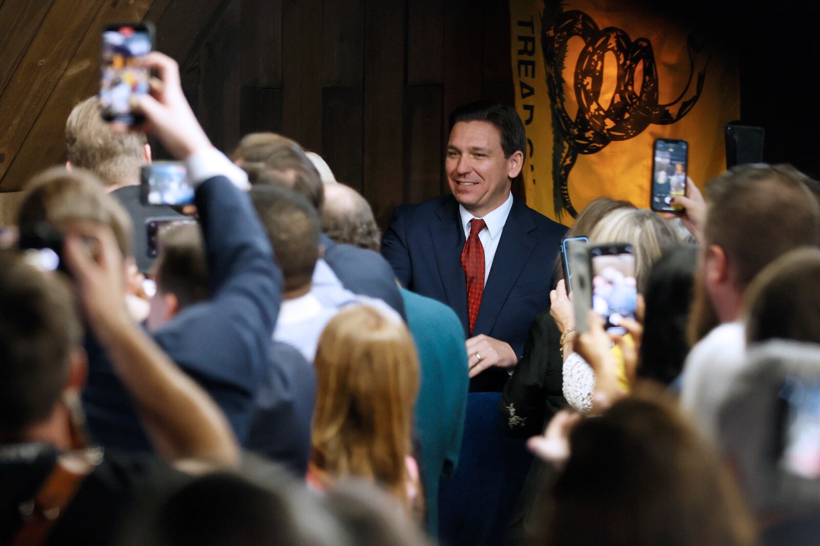 Florida Gov. Ron DeSantis greets supporters in March at Adventure Outdoors in Smyrna for an event spotlighting his newly released book, "The Courage To Be Free: Florida's Blueprint For America's Revival." Miguel Martinez / miguel.martinezjimenez@ajc.com