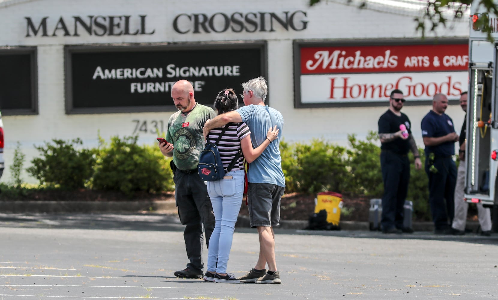 June 14, 2022 Alpharetta: An armed man who was barricaded inside a HomeGoods store in Alpharetta was taken into custody Tuesday June 14, 2022 after a standoff with SWAT. The man allegedly brandished a gun and made threats, prompting evacuations at the store and nearby businesses on North Point Parkway just south of North Point Mall, according to Alpharetta police. He was led out of the building in handcuffs and a medical mask shortly before 1:30 p.m. His name and charges were not released. No shots were fired and no one was reported injured, but REI and Michaels were evacuated as police, fire and SWAT teams made camp in the shopping centerÕs parking lot. ÒWe do have the active scene contained,Ó Alpharetta police Lt. Andrew Splawn told reporters from the scene. ÒIf the public does have a reason to come to Alpharetta, the mall area, they are free to do so, but we do ask them to stay away from HomeGoods and the caution tape area that is defined as the perimeter.Ó
Store employees told Channel 2 Action News that chaos ensued when a voice came over the store loudspeaker telling everyone to ÒrunÓ and Òget out.Ó According to Channel 2, the gunman is a disgruntled former employee. ÒThe manager came out of the office and she just told us, all of us, to run,Ó an unnamed employee told the news station. ÒThe store was open, there was customers in the store, and we ran.Ó Police arrived on scene within two minutes of the first 911 call, Splawn said. He could not confirm if the armed man was connected to the store. It was not a hostage situation, according to Splawn. ÒThere were people taking cover to barricade themselves for safety, but as police officers were sweeping and searching the building, we were able to get everyone out safely,Ó he said. (John Spink / John.Spink@ajc.com)


