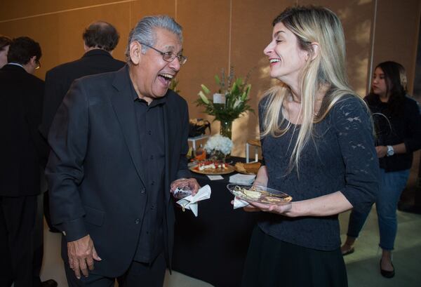 Juan Ramirez chats with ASO cellist Karen Freer before a performances at the Atlanta History Center in October. Contributed by Steve Schaefer