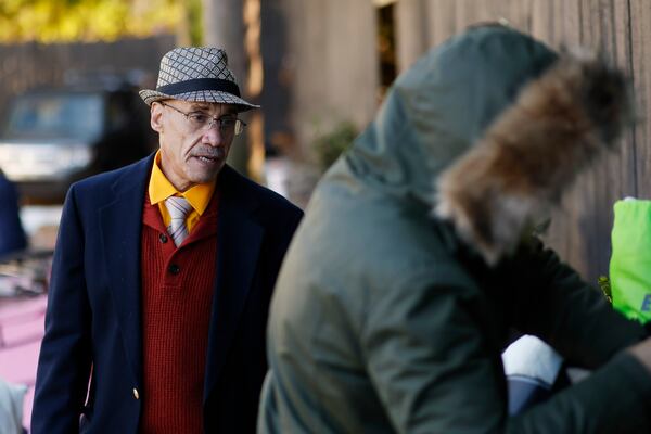 Santiago Murat (left) is homeless and now a volunteer with the nonprofit Elizabeth Foundation. He speaks with another person collecting items she received from the organization on Sunday, November 13, 2022.
Miguel Martinez / miguel.martinezjimenez@ajc.com