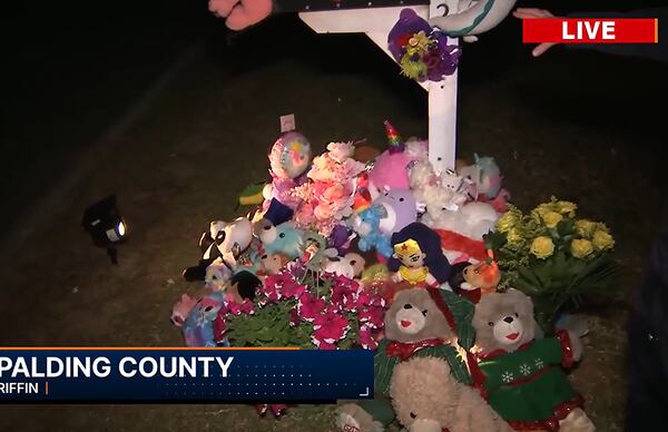 A memorial sits outside the Spalding County home where Katelynn Simonds died in a fire over the weekend. 