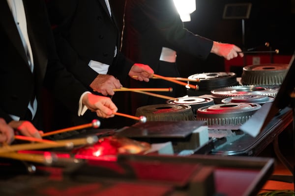 Percussionists offstage played nontraditional instruments, including car parts, during the Ring Cycle work.