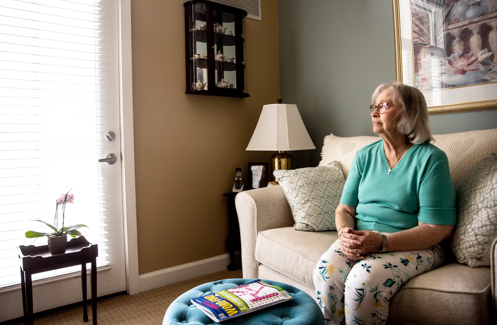 Ann Vermilya is in her home at the Silver Comet Village in Powder Springs Wednesday.  The 81-year-old has lived in the independent living facility for a year and a half. She loves the facility, but would like the facility's financial issues to be resolved. (Jenni Girtman for The Atlanta Journal-Constitution)