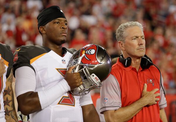 Tampa Bay Buccaneers quarterback Jameis Winston (3) and head coach Dirk Koetter before an NFL football game against the Cleveland Browns Friday, Aug. 26, 2016, in Tampa, Fla. (AP Photo/Chris O'Meara)