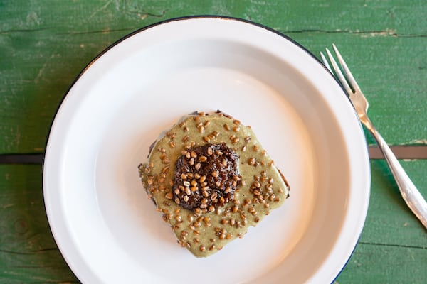 Pumpkin seed butter and raisin jam crispy grains on butter toasted multigrain bread. Photo credit- Mia Yakel.