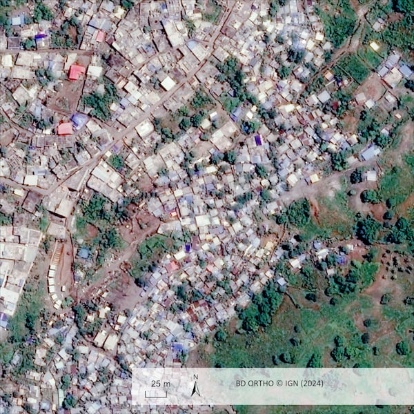 This undated satellite photo provided on Wednesday Dec. 18, 2024 by the Institut Geographique National (IGN) shows Bandrajou, in the Indian Ocean French territory of Mayotte, before the cyclone Chido. (IGN via AP)