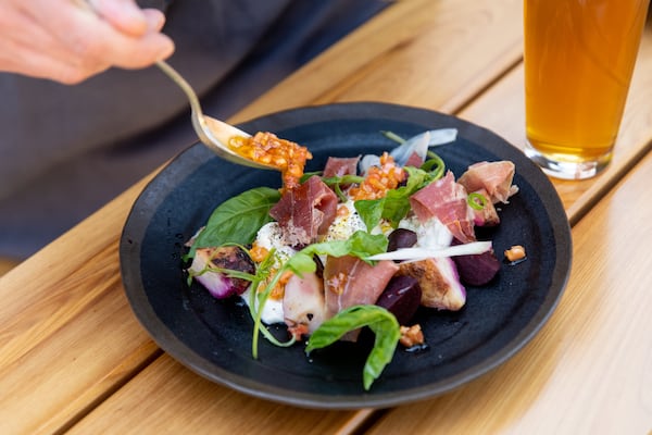 Biggerstaff Warm Burrata with country ham, roasted turnips, pickled beets, and arugula. (Mia Yakel for The Atlanta Journal-Constitution)