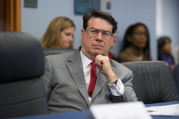 Sandy Springs Mayor Rusty Paul during a county meeting at the Fulton County Government Center in December 2015. 