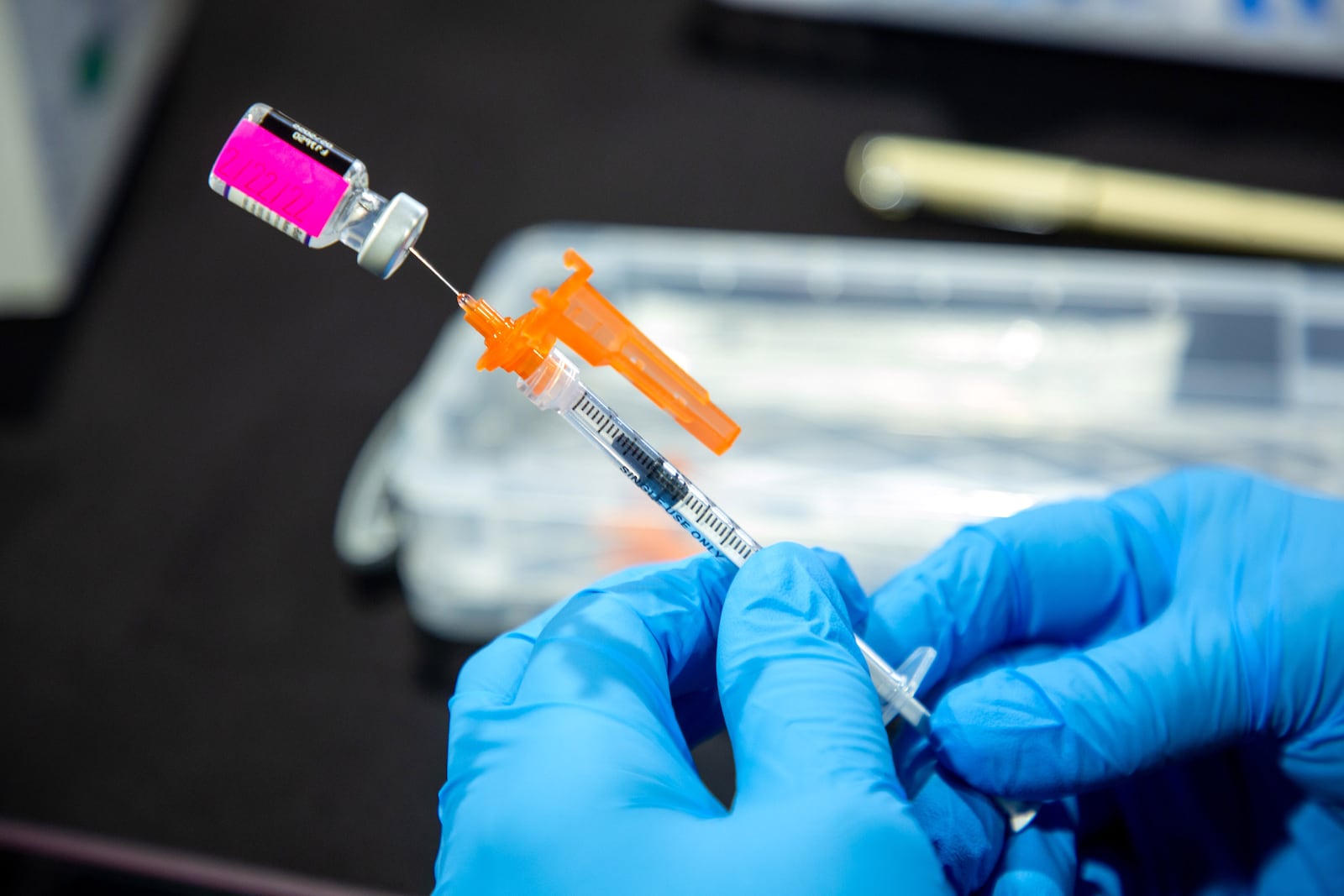 Nurse Wanda Night - Allen fills vaccine syringes at the Impact Church Thursday, February 10, 2022. STEVE SCHAEFER FOR THE ATLANTA JOURNAL-CONSTITUTIONCONSTITUTION