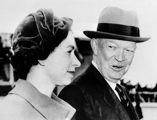 The Queen Elizabeth II is welcomed by President Eisenhower, 18 October 1957 in Washington. (Photo credit should read /AFP/GettyImages)