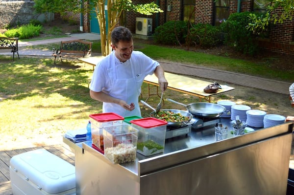 Chef Ian Winslade performing a cooking demo at Morningside Elementary