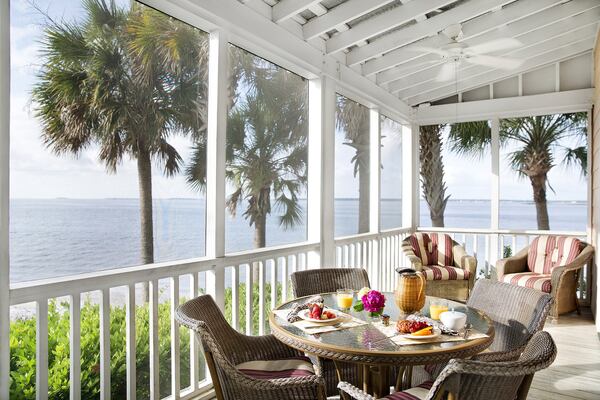 All the cottages at The Cottages on Charleston Harbor have large screened-in porches overlooking the water. Contributed by Cottages on Charleston Harbor