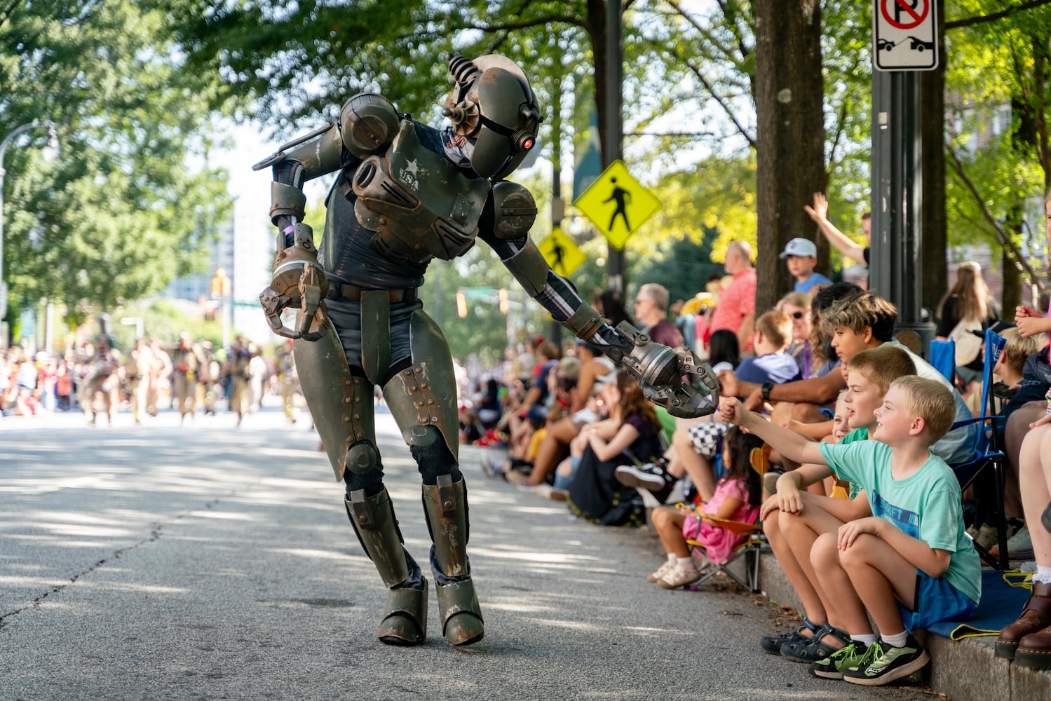 Thousands lined up along Peachtree Street Saturday morning for the annual Dragon Con parade.