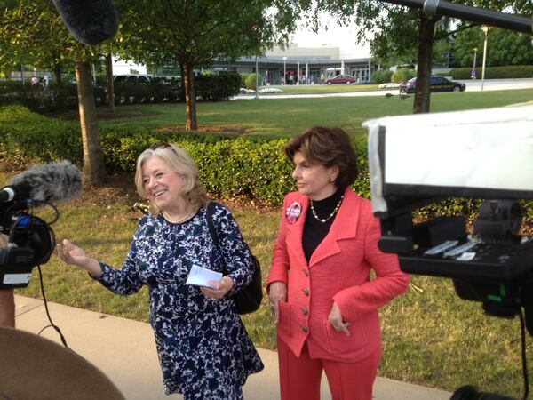 Gloria Allred on May 2, 2015 outside Bill Cosby's show at Cobb Energy Performing Arts Centre with fellow protest Bonnie Upton. CREDIT: Rodney Ho/ rho@ajc.com