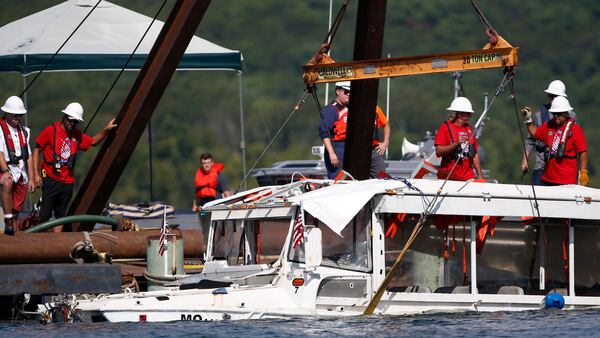 The duck boat that sank in Table Rock Lake in Branson, Mo., is raised Monday, July 23, 2018. The National Transportation Safety Board stated in its preliminary report that the weather turned deadly in a matter of minutes.