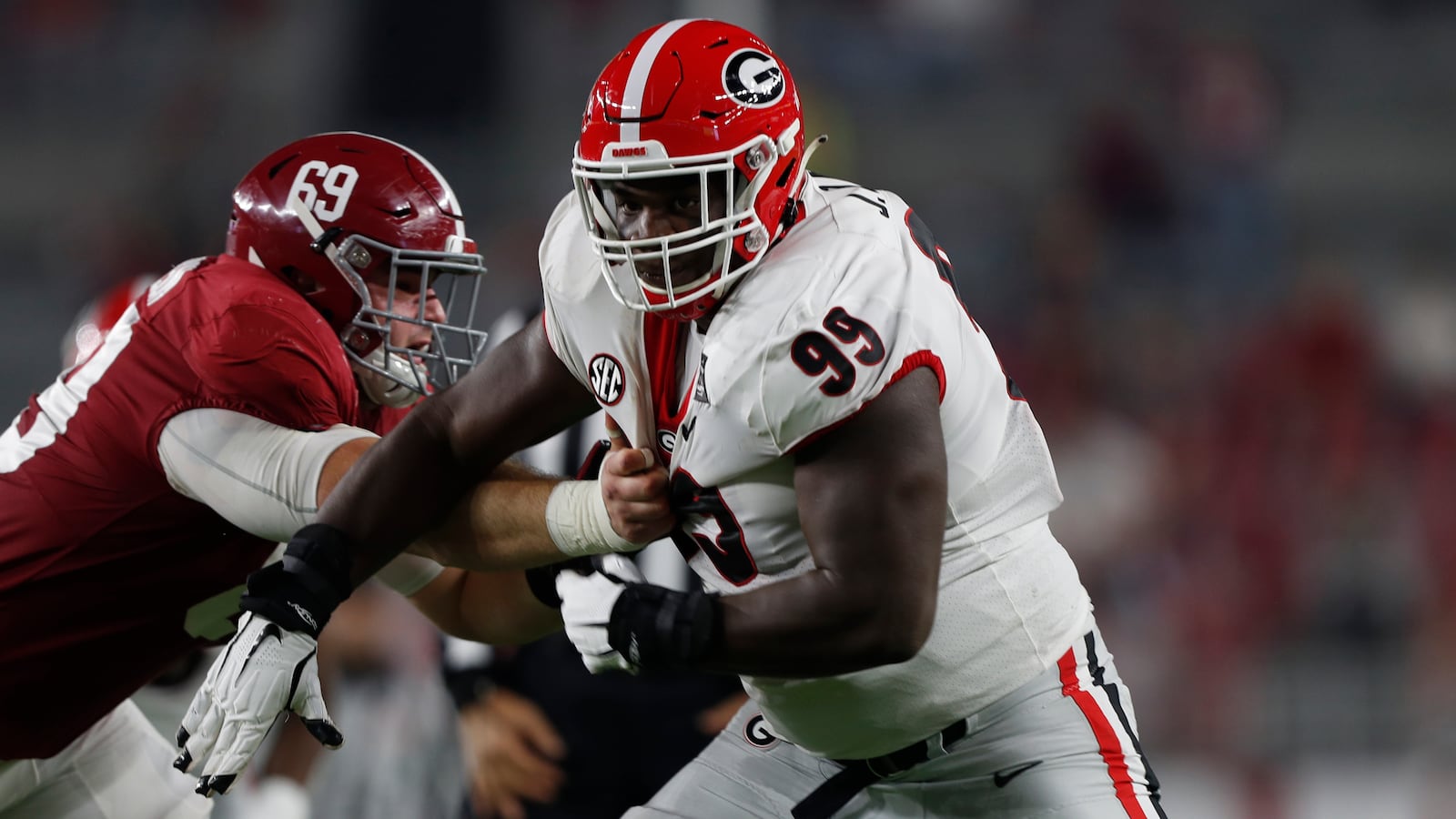 Georgia defensive lineman Jordan Davis (99) battles to stop a play against Alabama Saturday, Oct. 17, 2020, in Tuscaloosa, Ala. (Skylar Lien/University of Alabama)