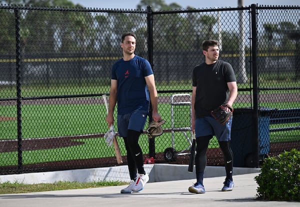 Atlanta Braves first base Matt Olson (left) and third base Austin Riley walk back to the clubhouse during spring training workouts at CoolToday Park, Thursday, February 13, 2025, North Port, Florida. (Hyosub Shin / AJC)