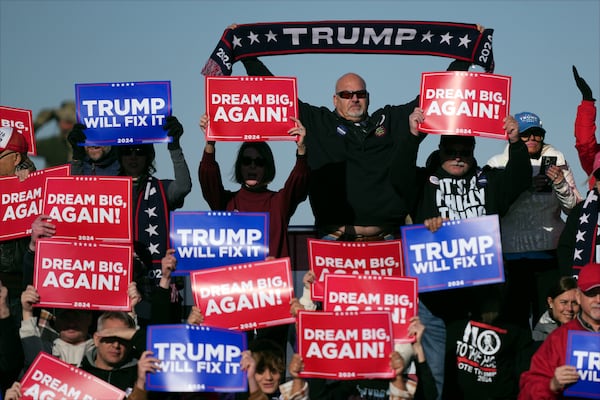 Supporters arrive before Republican presidential nominee former President Donald Trump at a campaign rally in Lititz, Pa., Sunday, Nov. 3, 2024. (AP Photo/Matt Rourke)